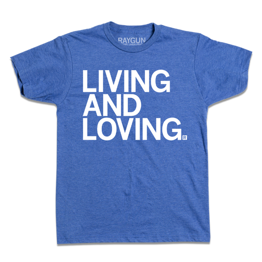 A kids sized heather royal t-shirt with left aligned white ink text that says, "Living and Loving"