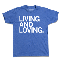 A kids sized heather royal t-shirt with left aligned white ink text that says, "Living and Loving"