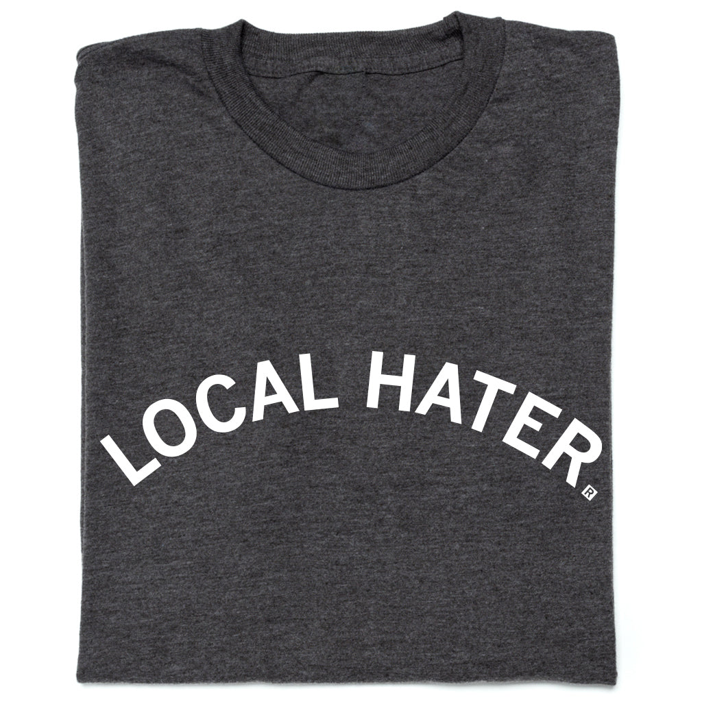 Charcoal gray RAYGUN t-shirt with the words LOCAL HATER printed in an arched white font.