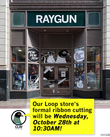 Storefront of the Raygun shop with a yellow speech bubble announcing a ribbon cutting ceremony on Wednesday, October 28th at 10:30 AM.