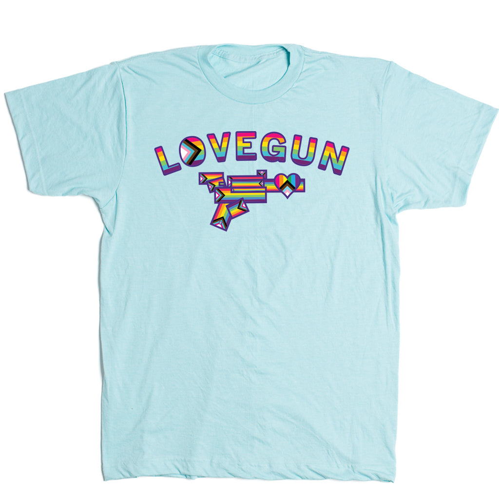 Heather purist blue t-shirt featuring the word LOVEGUN in rainbow lettering above a geometric, rainbow-colored pistol icon.