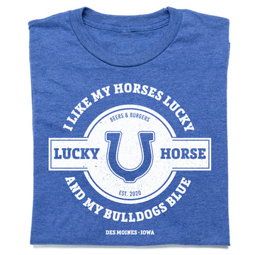 Union-made blue heathered RAYGUN T-shirt featuring a white graphic of a horseshoe and the text I Like My Horses Lucky and My Bulldogs Blue, Beers & Burgers, Est. 2020, Des Moines, Iowa.