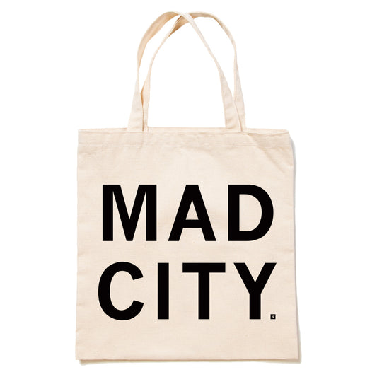Natural canvas tote bag in off-white, featuring the text MAD CITY in a large, black sans-serif font.