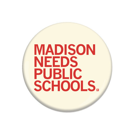 A round RAYGUN pin with red text on a cream background that reads, MADISON NEEDS PUBLIC SCHOOLS.
