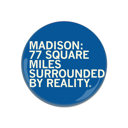 Blue RAYGUN pinback button with white text that reads, MADISON: 77 SQUARE MILES SURROUNDED BY REALITY.