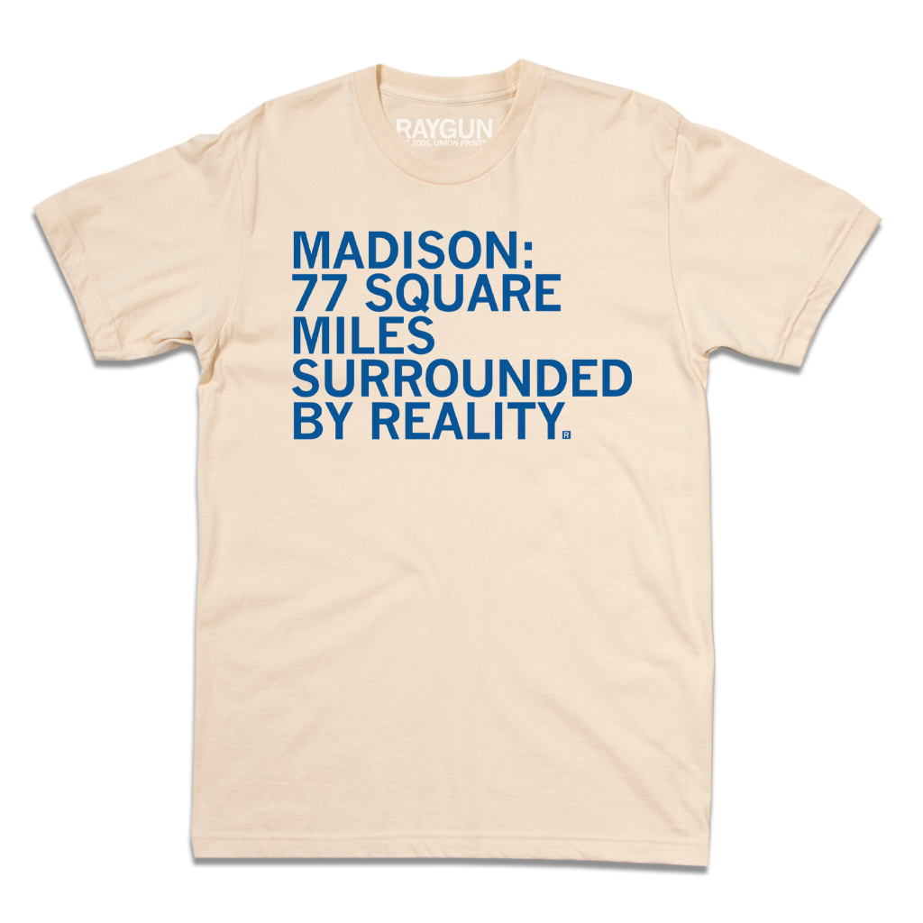 Cream-colored Madison t-shirt with blue text that reads, MADISON: 77 SQUARE MILES SURROUNDED BY REALITY.