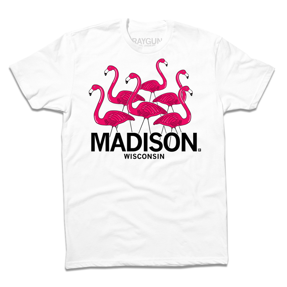 White shirt with an illustration of six lawn flamingos looking in different directions above "Madison Wisconsin" printed in black ink.