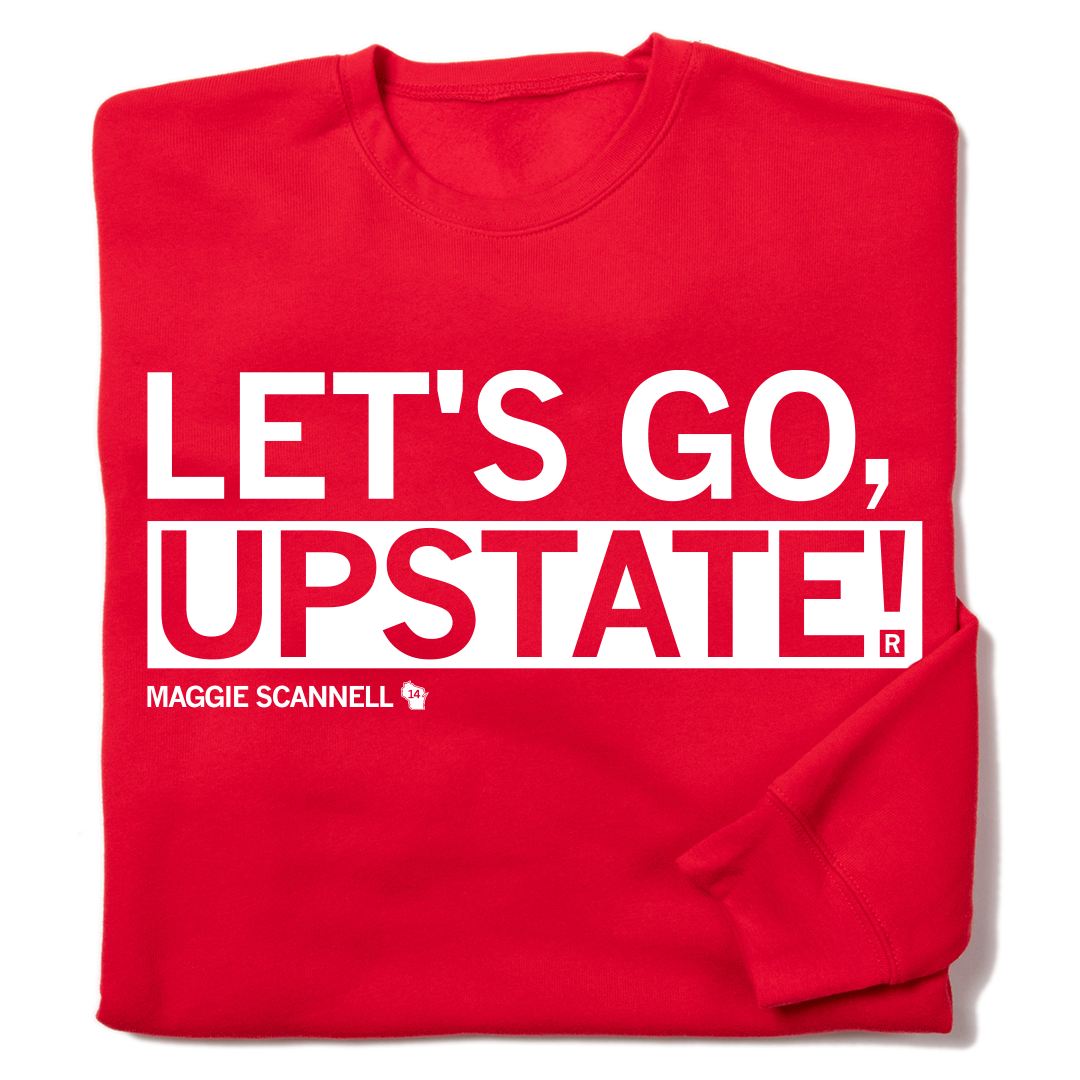 Folded red crewneck sweatshirt with white ink text that says, "LET'S GO UPSTATE!" over smaller text that reads "MAGGIE SCANNELL" beside a small outline of Wisconsin with the number 14 in the center.