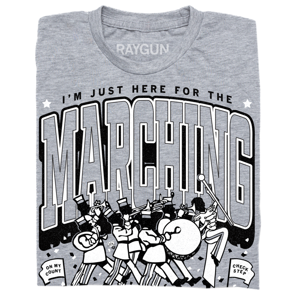 Heather grey t-shirt featuring a marching band illustration and the text, I’m just here for the marching.
