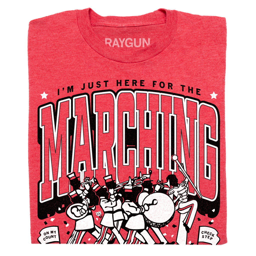 Heather red t-shirt featuring a graphic of a marching band with the text I’m just here for the marching, On my count, and Check step.