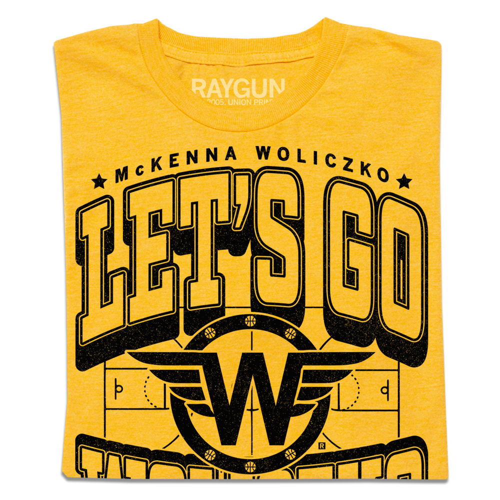 Folded gold t-shirt that says, "Let's Go Woliczko" in large black outlined font over an illustration of a basketball court with a W with wings in the center.