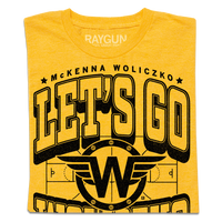 Folded gold t-shirt that says, "Let's Go Woliczko" in large black outlined font over an illustration of a basketball court with a W with wings in the center.