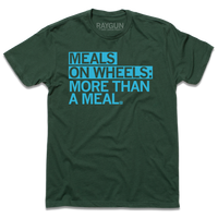 Short sleeve dark green t-shirt with bright blue print text that says, "Meals On Wheels: More than a meal"