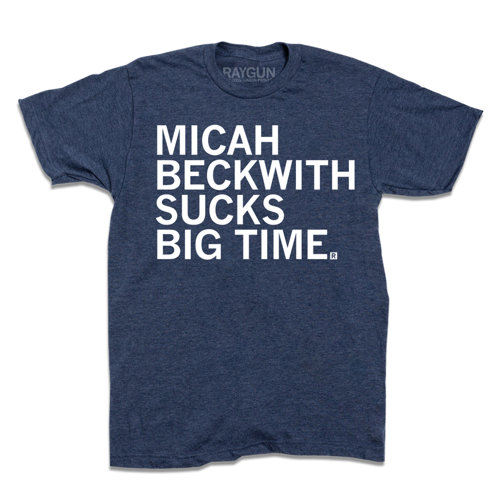 Heather navy short sleeve t-shirt with left-aligned white print text that reads "MICAH BECKWITH SUCKS BIG TIME"