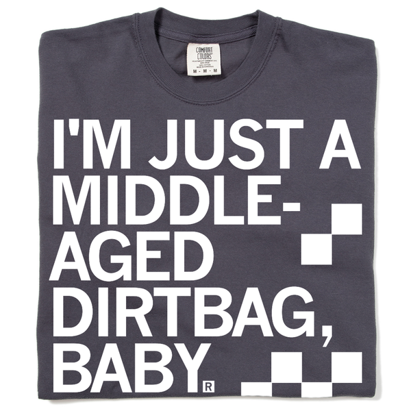 A folded dark grey t-shirt with left aligned white ink text that says, 