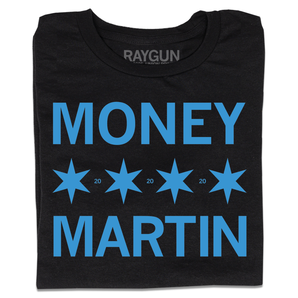 A folded black t-shirt with bright blue ink that says, "MONEY MARTIN" with four Chicago flag stars in the middle and small "20"s printed between them.