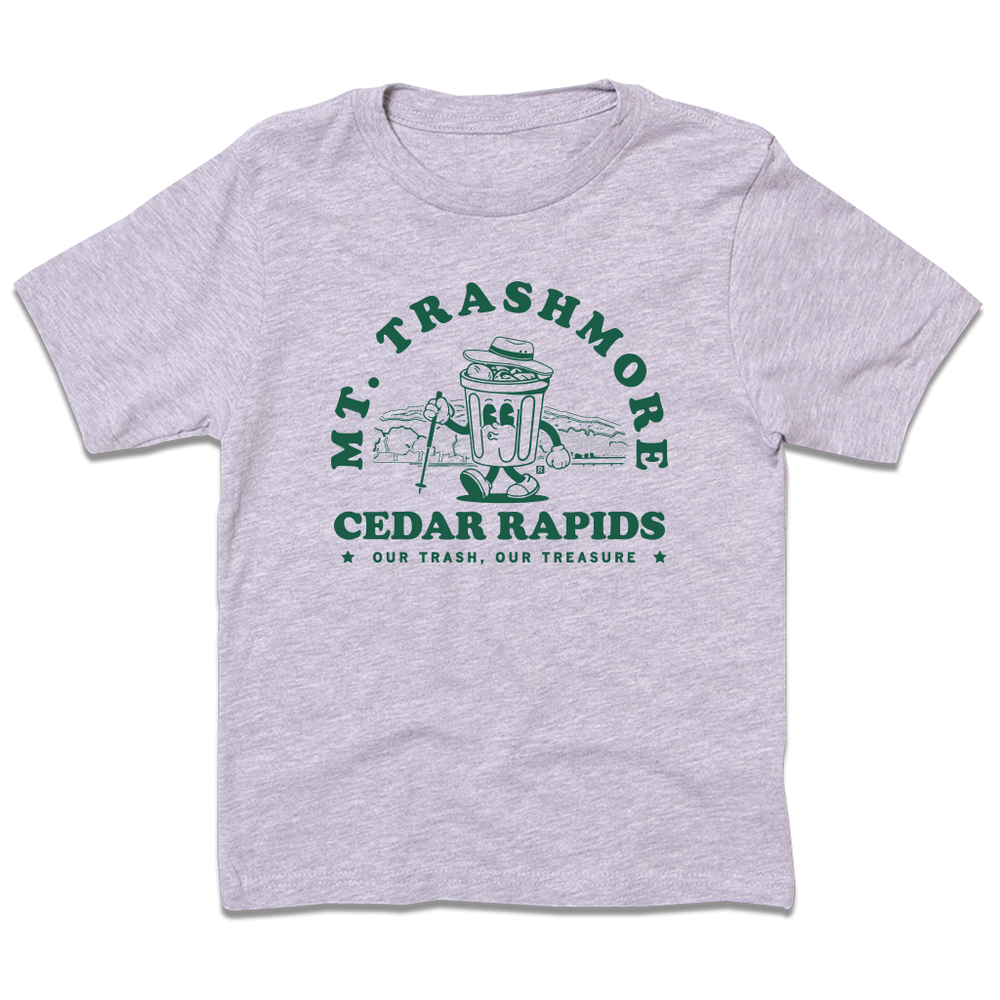 Heather grey youth size t-shirt with green ink that reads "Mt. Trashmore, Cedar Rapids. Our trash, our treasure" framing an image of a cartoon trashcan going for a hike with Mt. Trashmore in the background.