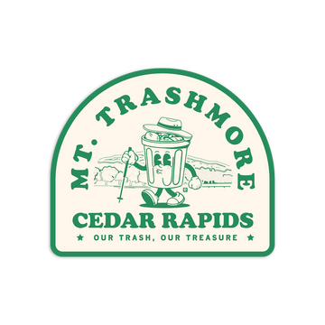 A cartoon trash can wearing a bucket hat and holding a hiking pole on a Mt. Trashmore vinyl sticker, with text reading Mt. Trashmore Cedar Rapids, Our Trash, Our Treasure.