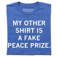 A heather royal t-shirt with centered white ink text that reads "My Other Shirt is a Fake Peace Prize"