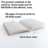 An open, union-made RAYGUN notebook from Des Moines, Iowa, featuring 64 pages of off-white paper and a card stock cover, perfect for those who value products made in the USA.