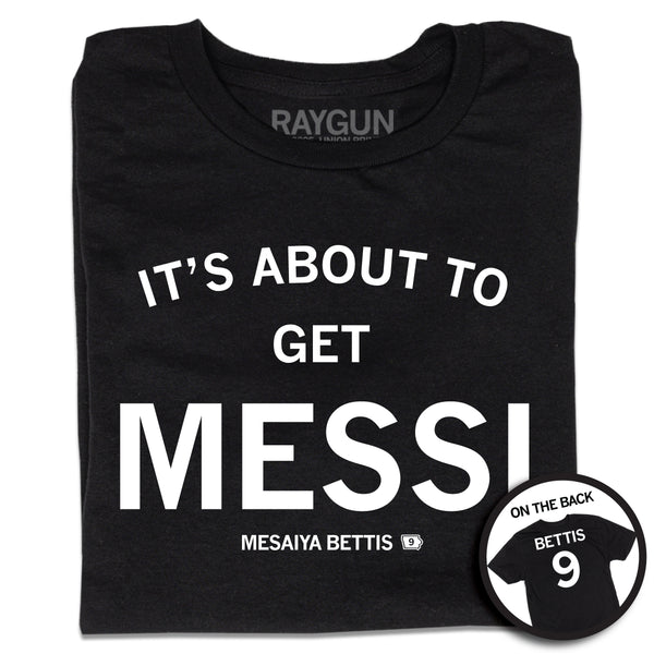 A folded short sleeve black t-shirt with centered white ink print that reads 