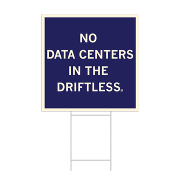 A dark blue square yard sign with off-white border and text that reads "No data centers in The Driftless."
