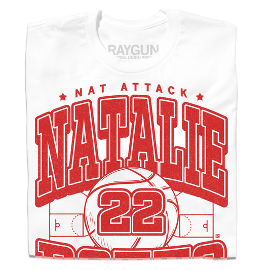 White t-shirt with bright red ink that says, "Nat Attack" in small font above "Natallie Potts 22" in large text." At the bottom it reads "St. Louis MO * Forward" and all of the text is above a volleyball court.