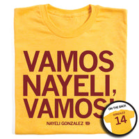 A folded heather yellow t-shirt with centered cardinal print ink that says, "VAMOS NAYELI, VAMOS!" with "NAYELI GONZALEZ" in smaller text below. A small, circle photo in the bottom right shows the back of the shirt printed like a jersey. The back has "GONZALEZ" across the back above "14."