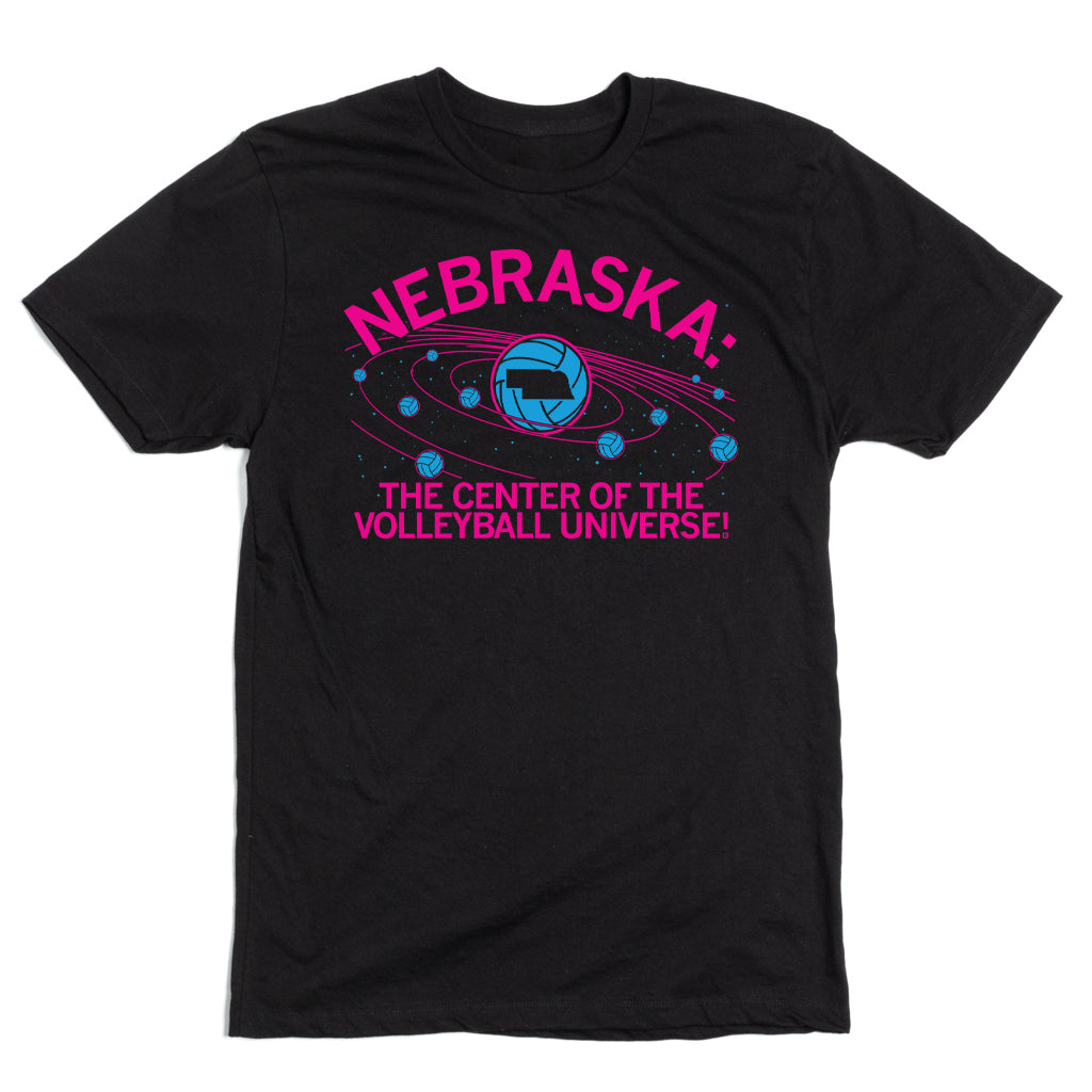 Black union made t-shirt featuring the text NEBRASKA: THE CENTER OF THE VOLLEYBALL UNIVERSE! surrounding a graphic of a blue volleyball as a planet with rings and orbiting miniature volleyballs.