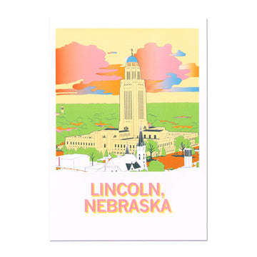 Illustrated Nebraska Capitol postcard of the state building in Lincoln under a colorful sunset sky, with the text LINCOLN, NEBRASKA at the bottom.