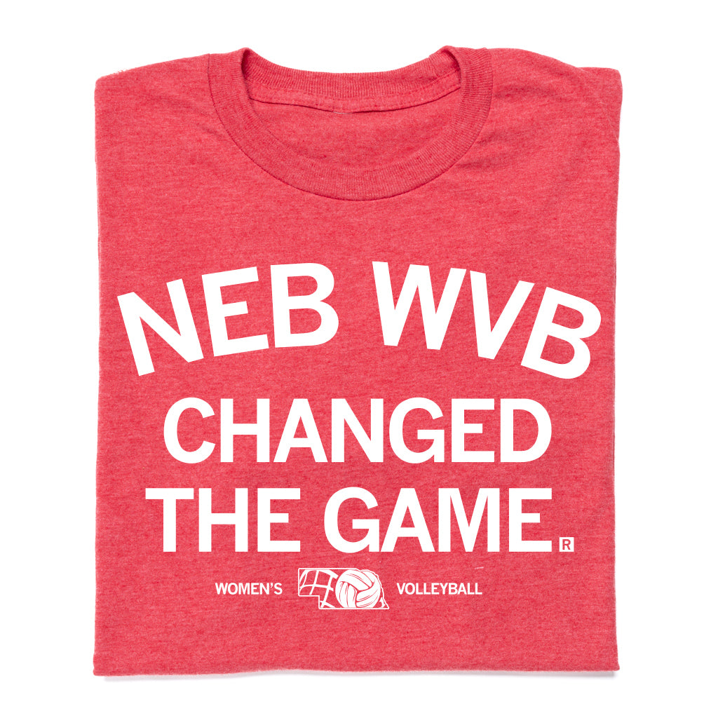Red Nebraska Women’s Volleyball RAYGUN t-shirt with white text reading NEB WVB CHANGED THE GAME and a volleyball graphic between the words WOMENS and VOLLEYBALL.