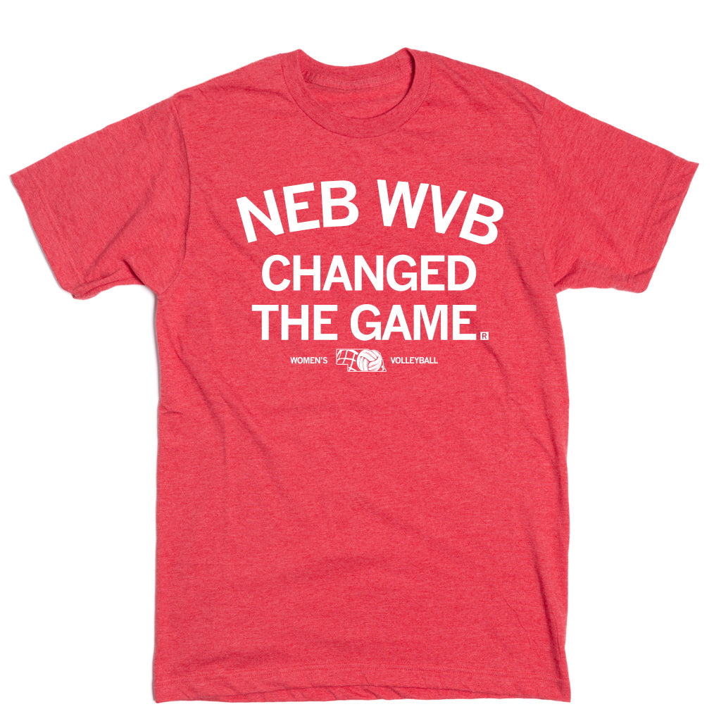 Red RAYGUN t-shirt featuring the white text NEB WVB CHANGED THE GAME above a Nebraska Women’s Volleyball logo.