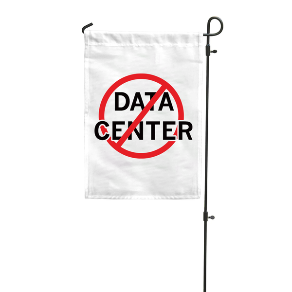 A white garden flag hanging vertically from a flag pole that has 