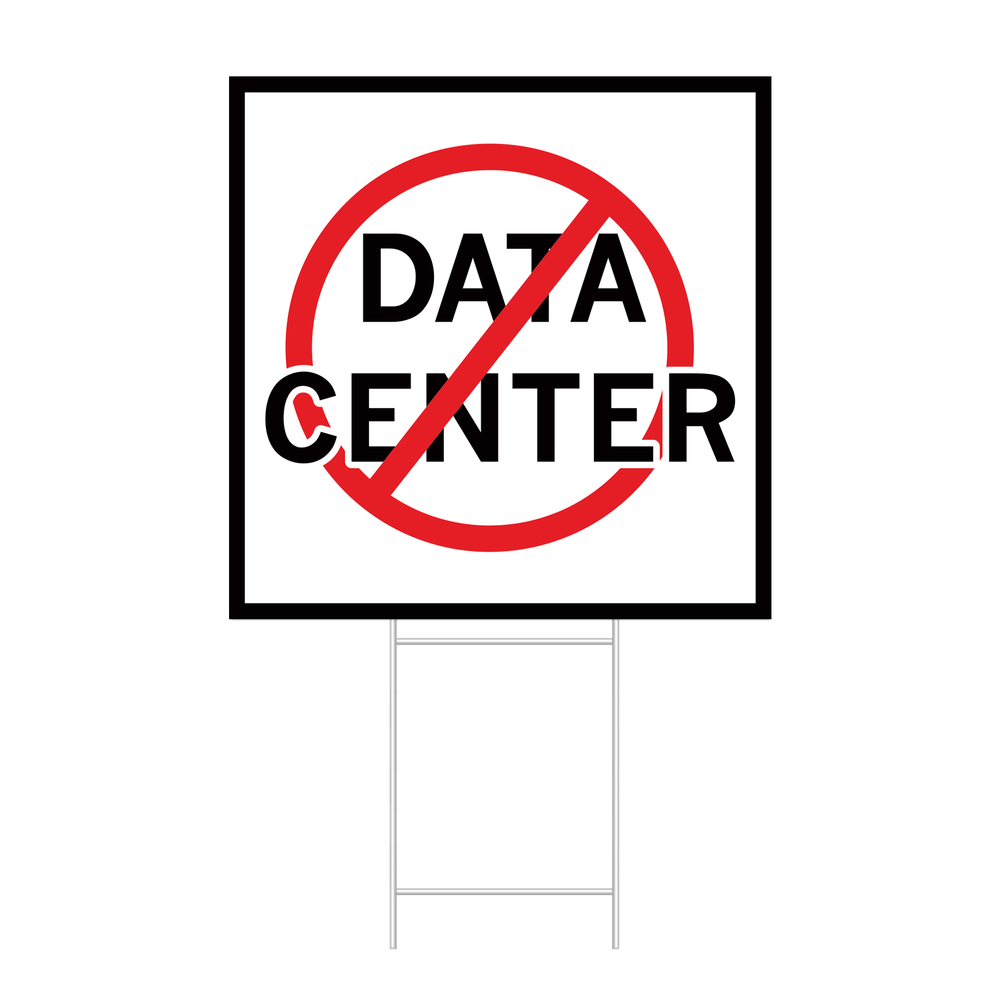A square white yard sing with a black border and black text that says, "Data Center" with a red circle around it and line through it.