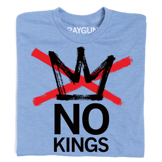 A heather light blue shirt with a blank ink crown and red ink X through it. Text below says, "NO KINGS"