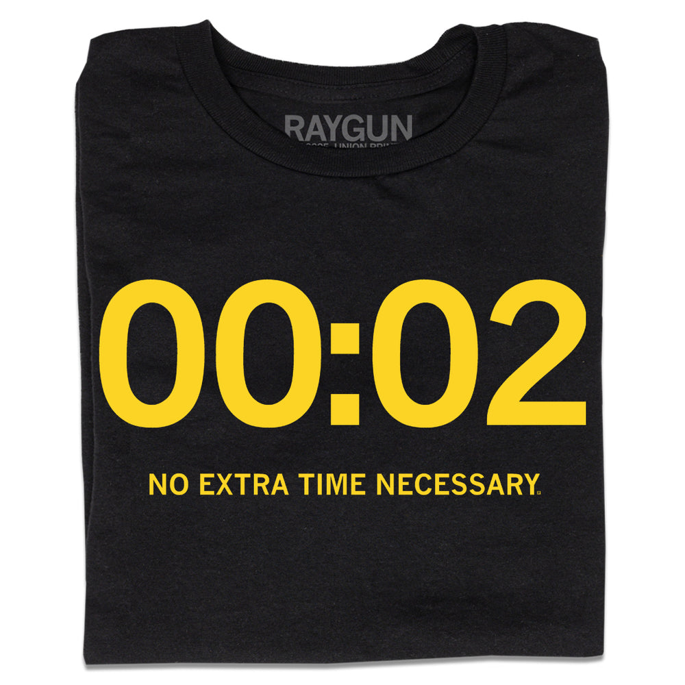 A folded black t-shirt with yellow ink that shows "00:02" in large print and "No Extra Time Necessary." in smaller text below.