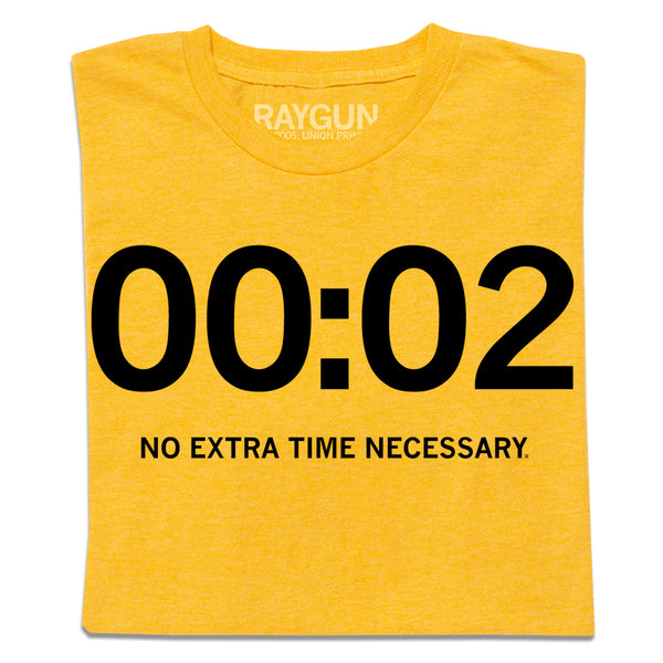 A folded heather gold t-shirt with black ink that shows 
