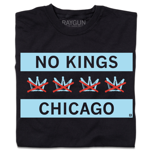 Black Chicago T-shirt featuring the text NO KINGS above four illustrations of crowns, each crossed out with a red X, followed by the text CHICAGO.