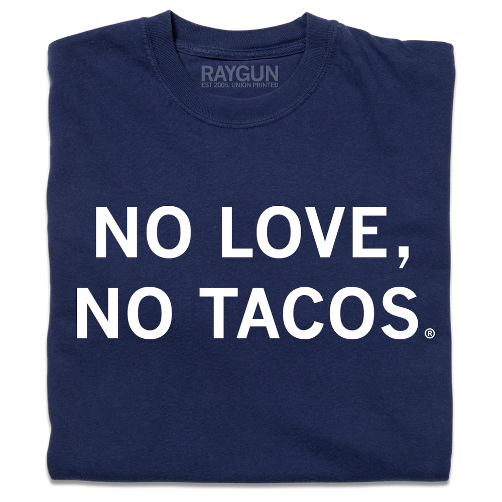 A folded comfort colors heavyweight navy t-shirt with centered white text that reads "No Love, No Tacos."