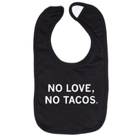 A black baby bib with centered white text that reads "No Love, No Tacos."