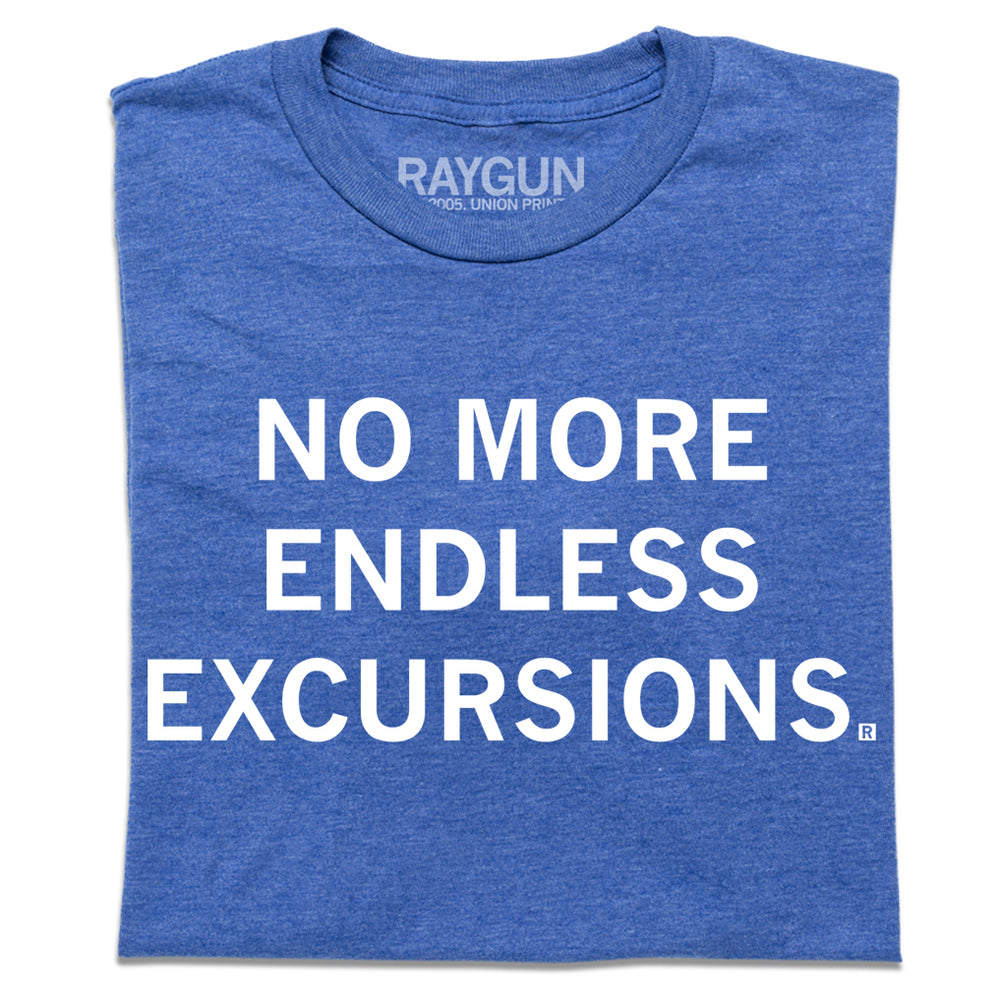 A folded heather royal blue t-shirt with white ink text that reads "No More Endless Excursions"