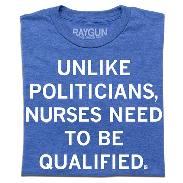 Heather royal blue tee with white ink text that reads, "Unlike politicians, nurses need to be qualified."
