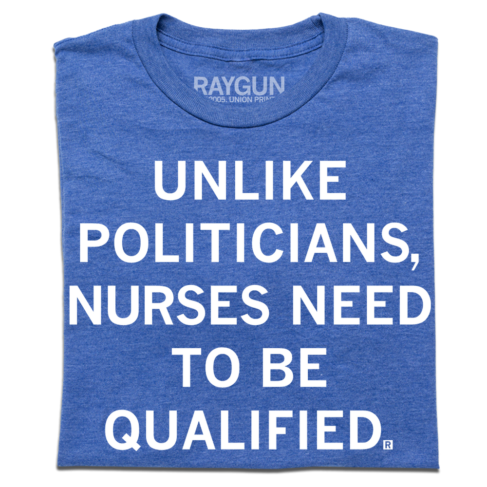 Heather royal blue tee with white ink text that reads, "Unlike politicians, nurses need to be qualified."
