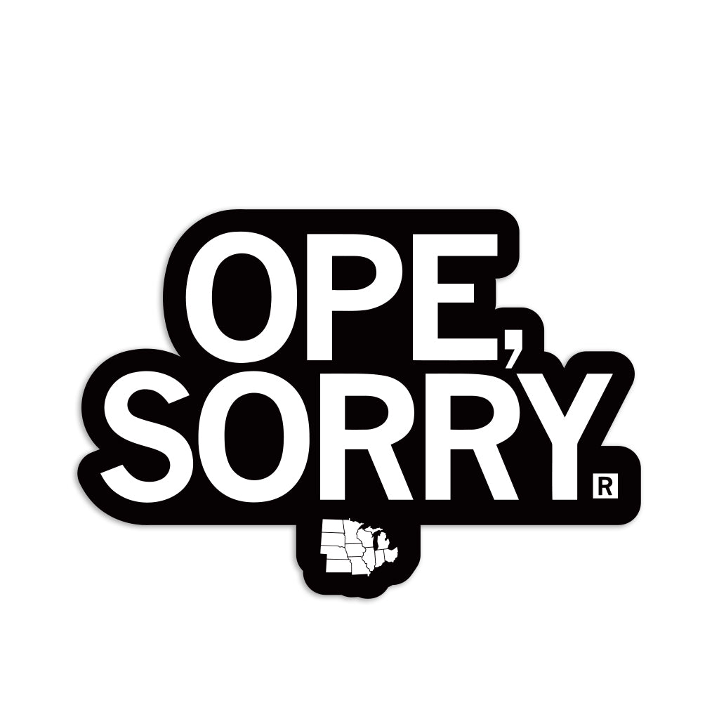 A die-cut vinyl sticker reading OPE, SORRY in white text on a black background, with a small white map of Michigan below the text.
