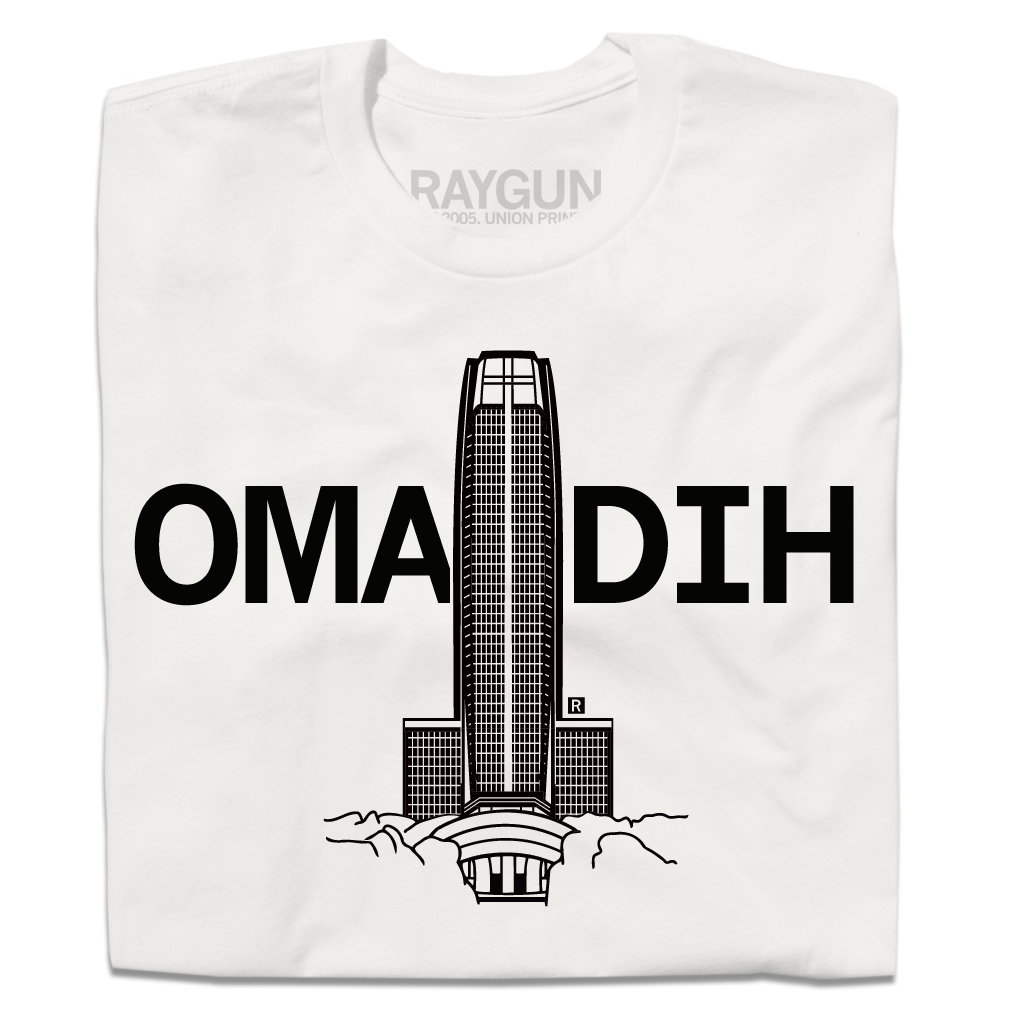 Bone-colored t-shirt with a graphic of a skyscraper behind the text OMADIH.