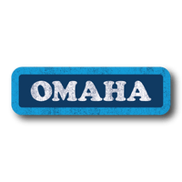 A rectangular dark blue sticker with a light blue border and white text that says, "OMAHA." The whole sticker is in a vintage style, faded look.