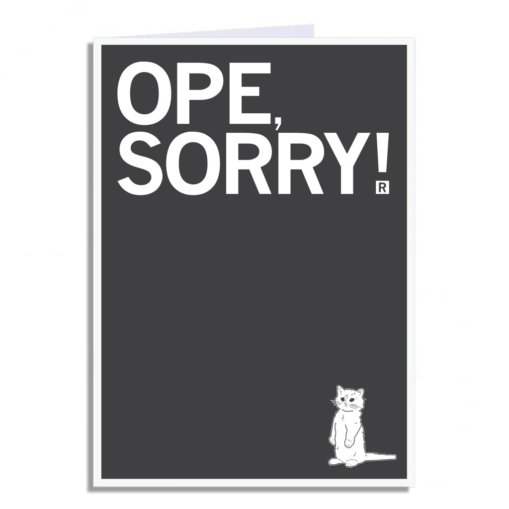 A RAYGUN greeting card with a dark gray background featuring the white text OPE, SORRY! and a small line drawing of a cat standing on its hind legs in the bottom right corner.