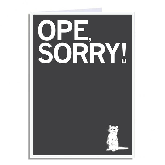 A RAYGUN greeting card with a dark gray background featuring the white text OPE, SORRY! and a small line drawing of a cat standing on its hind legs in the bottom right corner.