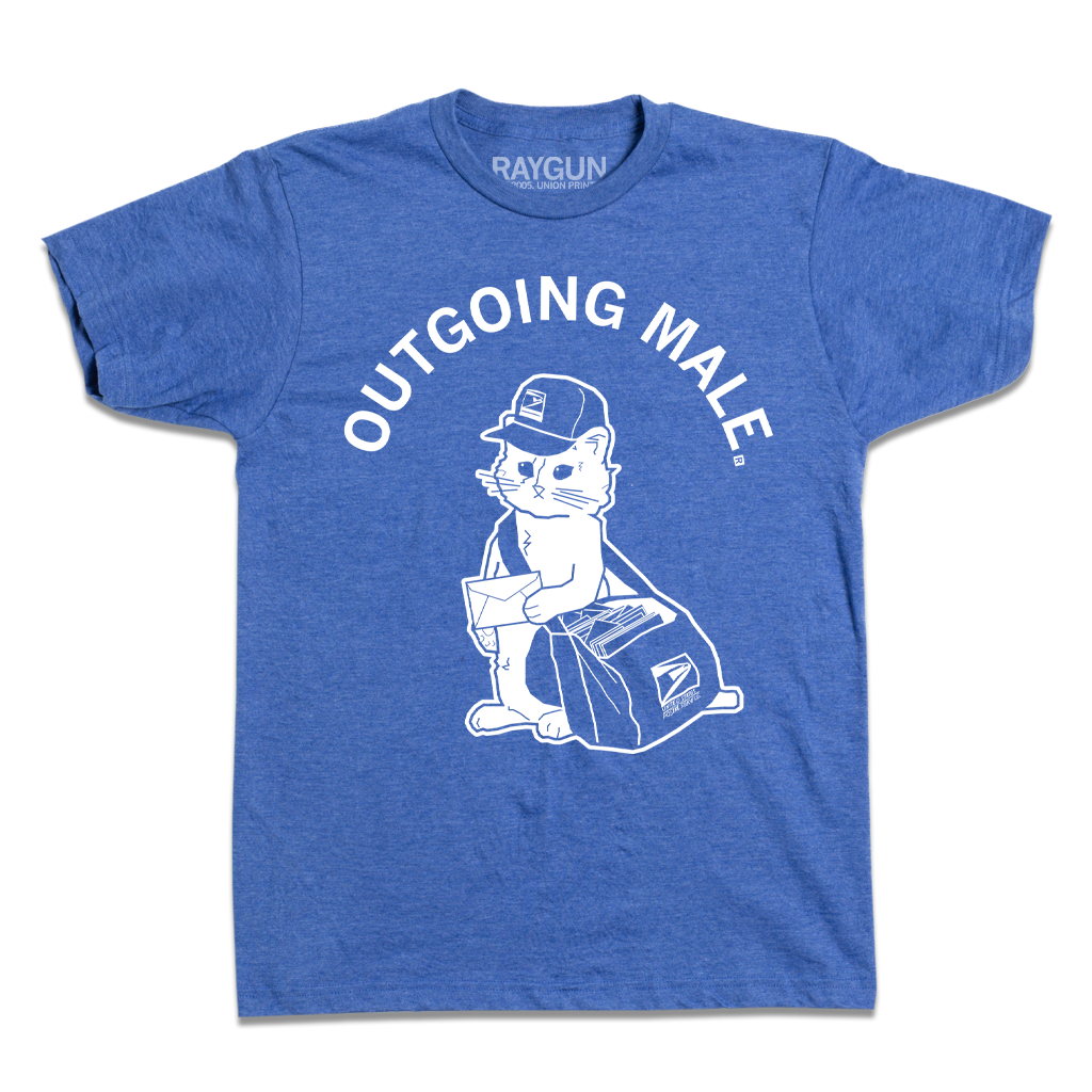 A heather royal blue t-shirt with curved white text near the top that says, "OUTGOING MALE" above an illustration of a cat dressed as a mail carrier with a mail back over his shoulder and a letter in hand.