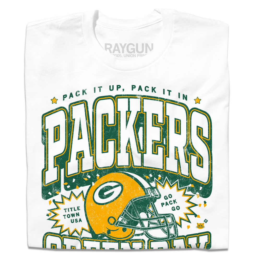 A folded white t-shirt with yellow and gold print that reads "Pack it up, pack it in. Title Town USA. Go Pack go. Green Bay Packers est. 1919. Lambeau Field." A  Green Bay Packers helmet is in the center and the design is laid out like a vintage college shirt.
